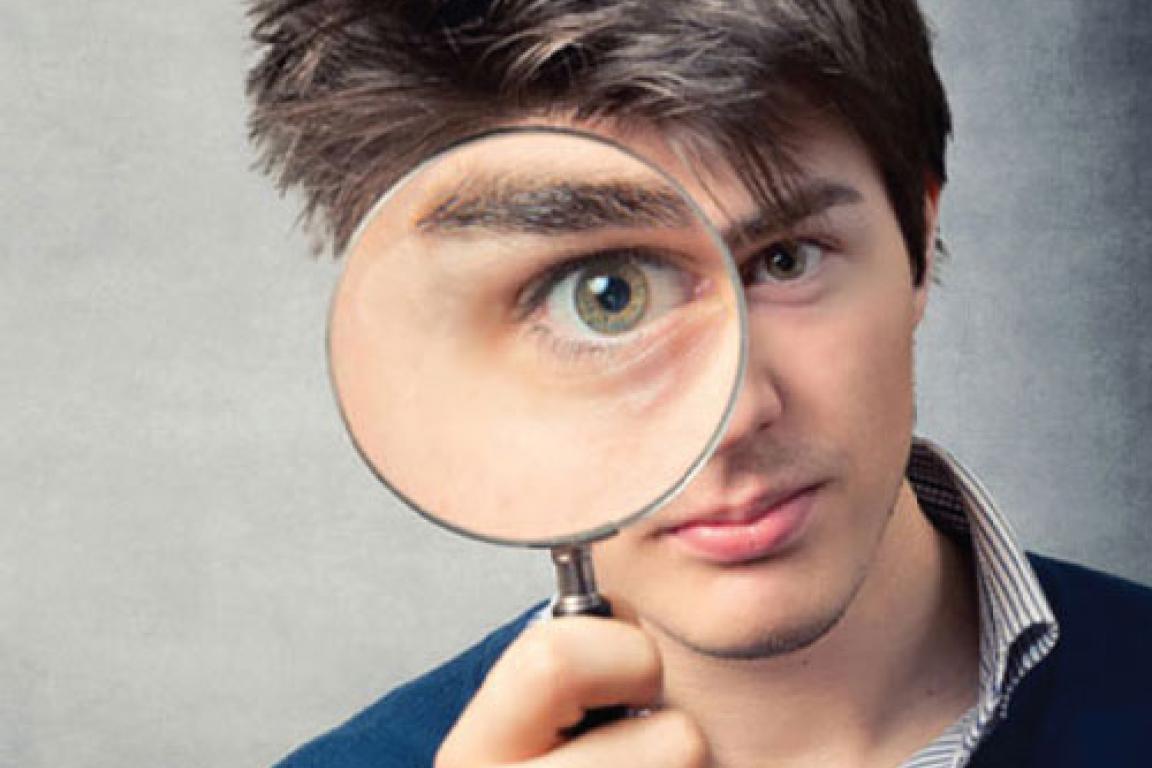 Man with magnifying glass