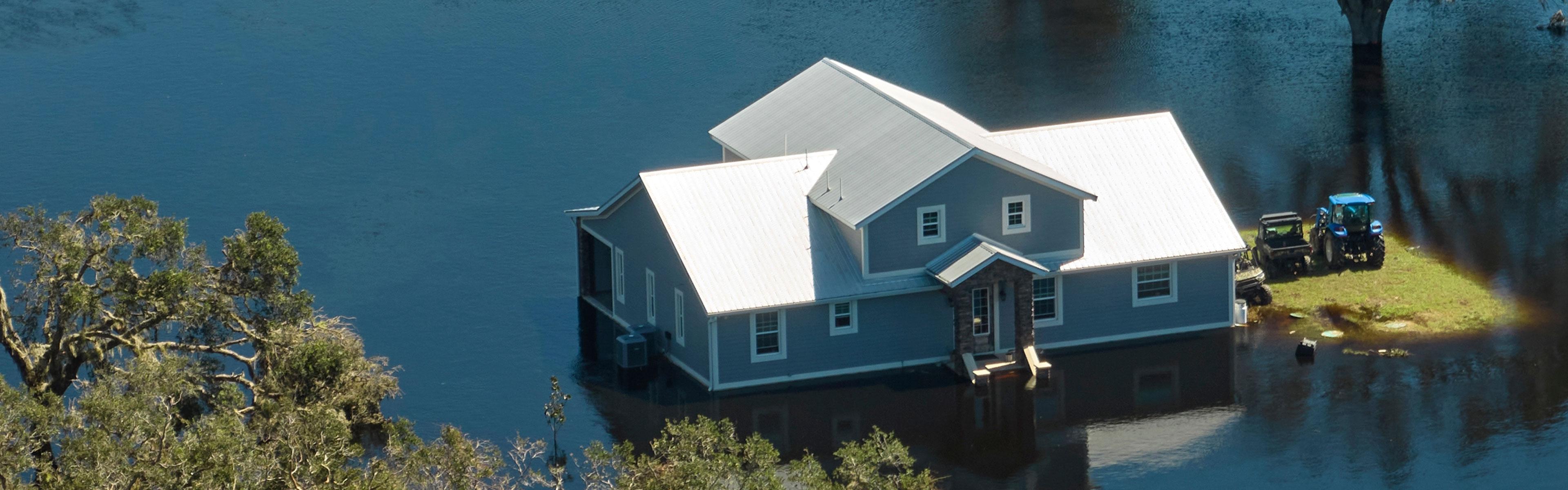 Flooded House surrounded by water