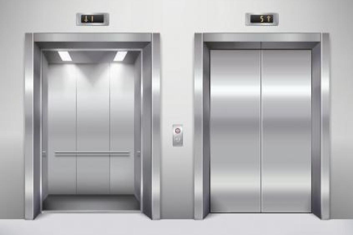 Two elevators side by side, with the doors closed